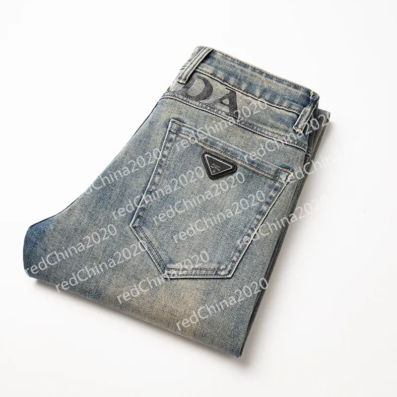 2024 Nueva primavera / otoño Nuevos pantalones vaqueros elásticos rasgados y ajustados para hombres Pantalones casuales clásicos