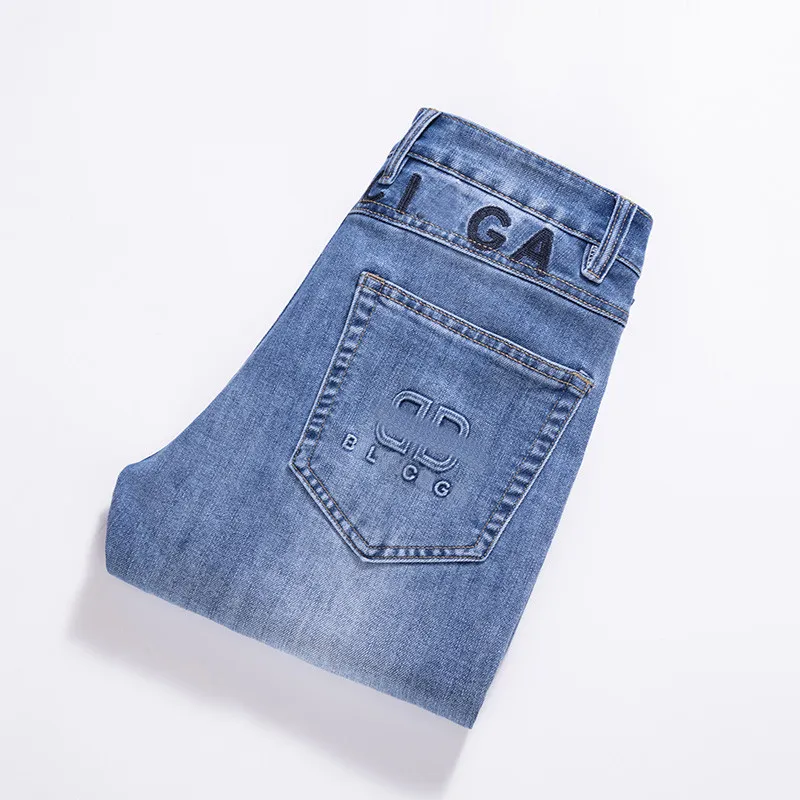 2024 Nueva primavera / otoño Nuevos pantalones vaqueros elásticos rasgados y ajustados para hombres Pantalones casuales clásicos